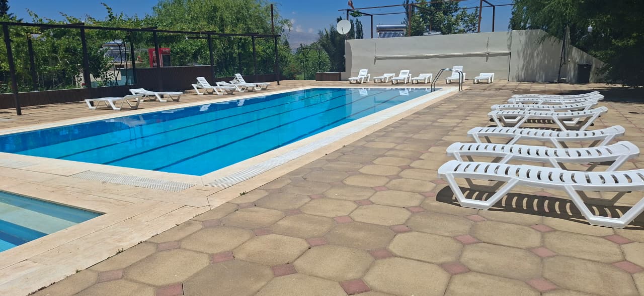 Pool sunbeds and lounge area